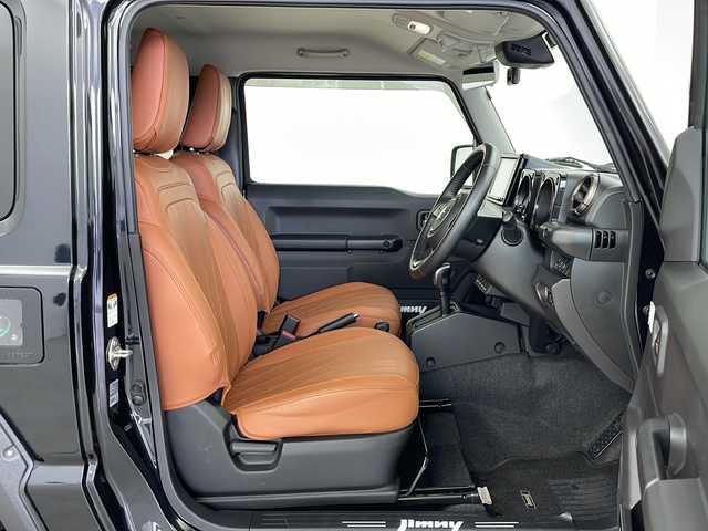 スズキ ジムニー XC 鹿児島県 2022(令4)年 2.4万km ブルーイッシュブラックパール3 GIGEAR1.5リフトアップ/GIGEARルーフラック＆リアラダー/社外9インチナビ/（AM/FM/CD/DVD/Bluetooth）/SUZUKIグリル/オレンジ革調キルティングシートカバー/クルーズコントロール/ドライブレコーダー/純正フロアマット/シートヒーターD/N席/純正ホイール/背面タイヤ/ABS/レーンキープアシスト/ダウンヒルアシスト/LEDヘッドライト/オートライト/ヘッドライトウォッシャー/アイドリングストップ/横滑り防止装置/盗難防止装置/衝突被害軽減システム/プッシュスタート/スマートキー/４WD