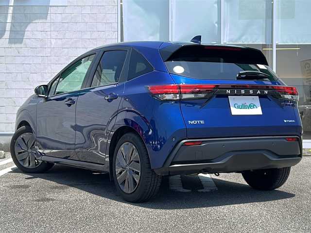 日産 ノート X 宮崎県 2023(令5)年 7.7万km オーロラフレアブルーパール 純正SDナビ（applecarplay/Bluetooth/TV）/全周囲カメラ/デジタルインナーミラー/プロパイロットシステム/ステアリングリモコン/ETC2.0/置くだけ充電/プッシュスタート/スペアキー/コーナーセンサー/オートライト/オートハイビーム/純正フロアマット