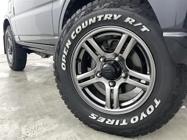 スズキ ジムニー ランドベンチャー 福島県 2015(平27)年 7.3万km ブルーイッシュブラックパール3 純正ナビ/・フルセグTV/BT/USB/CD/DVD/AM/FM/レザーシート/・シートヒーター/ステアリングリモコン/ETC/背面タイヤ/純正アルミホイール/リモコンキー/ターボ/４WD/AC/ミラーヒーター/ドアバイザー/ABS/横滑り防止装置/ハロゲンライト/フォグランプ/純正フロアマット