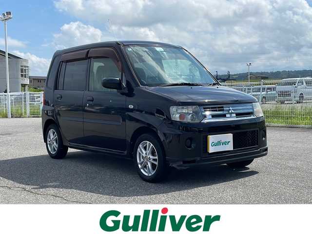 三菱 トッポ G 富山県 2012(平24)年 10.4万km アメジストブラック 禁煙車/４WD/社外ＳＤナビ/フルセグＴＶ/ＢｌｕｅＴｏｏｔｈ・ＣＤ/社外アルミホイール/社外フロアマット/ベンチシート/シートヒーター/ＥＴＣ/キセノンヘッドライト/リモコンキー/保証書・記録簿/取扱説明書