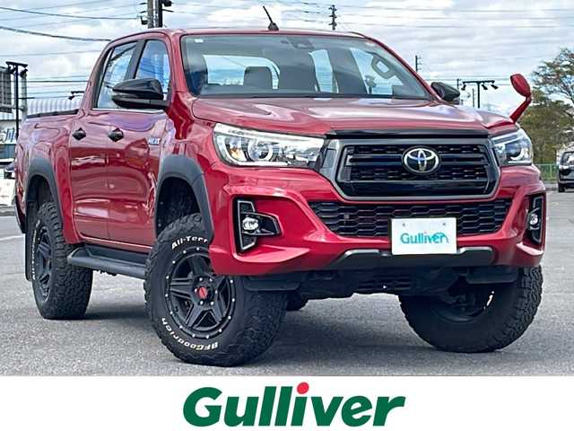 トヨタ ハイラックス Z ブラックラリーエディション 道央・札幌 2019(令1)年 6.4万km クリムゾンスパークレッドM ４WD/寒冷地仕様/純正ディーラーOPナビ/CD/DVD/BT/フルセグ/プリクラッシュセーフティ/横滑り防止装置/レーダークルーズコントロール/ダウンヒルアシストコントロール/レーンキープアシスト/デフロック/フロント/バックカメラ/ETC/ECOMODE/PWRMODE/トランスファ切替/レザー調シートカバー/ステアリングリモコン/MTモード付AT/プッシュスタート/スマートキー/LEDヘッドライト/オートライト/フォグランプ/電動格納ミラー/ヒーテッドドアミラー/ウィンカーミラー/純正フロアマット