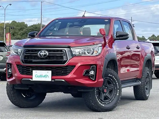 トヨタ ハイラックス Z ブラックラリーエディション 道央・札幌 2019(令1)年 6.4万km クリムゾンスパークレッドM ４WD/寒冷地仕様/純正ディーラーOPナビ/CD/DVD/BT/フルセグ/プリクラッシュセーフティ/横滑り防止装置/レーダークルーズコントロール/ダウンヒルアシストコントロール/レーンキープアシスト/デフロック/フロント/バックカメラ/ETC/ECOMODE/PWRMODE/トランスファ切替/レザー調シートカバー/ステアリングリモコン/MTモード付AT/プッシュスタート/スマートキー/LEDヘッドライト/オートライト/フォグランプ/電動格納ミラー/ヒーテッドドアミラー/ウィンカーミラー/純正フロアマット