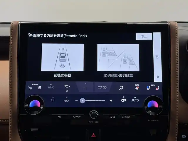 トヨタ ヴェルファイア ハイブリット Z プレミア 三重県 2024(令6)年 0.7万km ブラック ハイブリッド/FF/MTモード付フロアCVT/14型ナビ/（FM/AM/TV/Bluetooth/USB/iPod/Miracast/CarPlay/AndroidAuto）/13.2型 有機EL後席モニター V13T-R72F/パノラミックビューモニター（床下透過機能付）/モデリスタエアロ（F/S/R下）、シグネチャーイルミブレード/両側パワースライドドア/ドラレコ前後/ETC2.0/Toyota Safety Sense/●PCS、LTA、レーダークルコン、アダプティブハイビーム、RSA、PDA、緊急操舵支援＋前後クロストラフィックアラート*/●パーキングサポートブレーキ/・BSM/LCA/安心降車アシスト/・Advanced Drive/アドバンスト・パーク　など/装備/・【OP】デジタルインナーミラー/・【OP】ユニバーサルステップ（両側）/・左右独立ムーンルーフ/・プレミアムナッパ本革シート（茶）/・シートヒーター＆ベンチレーション（D/N/2nd）/・ステアリングヒーター/・パワーシート（Dメモリー付8way/N4way/2ndリクライニング＆オットマン）/・パワーバックドア/・HUD/・100Vコンセント（1500W）/・タッチトレーサーオペレーション/・3眼LEDヘッドランプ/・おくだけ充電/・19inAW/・保/・スマートキーx2/など