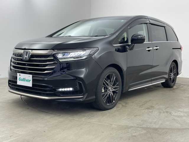 ホンダ オデッセイ ハイブリッド e:HEVアブソルート EX 兵庫県 2020(令2)年 4.7万km プレミアムスパークルブラックパール ・純正ナビ/・Bluetooth/CD/DVD/USB/TV/SD/HDMI/Apple car play/・全方位カメラ/・Honda SENSING/・衝突軽減ブレーキ（CMBS）、/・誤発進抑制機能/・後方誤発進抑制機能、歩行者/・事故低減ステアリング/・路外逸脱抑制機能/・渋滞追従機能付アダプティブクルーズコントロール（ACC）/・車線維持支援システム（LKAS）/・先行車発進お知らせ機能/・標識認識機能/・オートマチックハイビーム/・車両接近通報装置/・レーントレーシングアシスト/・ブラインドスポットシステム/・パワーバックドア/・フリップダウンモニター/・前後コーナーセンサー/・両側パワースライドドア/・ハーフレザーシート/・パワーシート/・シートヒーター/・オットマン/・純正フロアマット/・純正前後ドライブレコーダー/・ビルトインETC2.0/・AC100V充電/・純正18インチアルミホイールタイヤ/・LEDヘッドライト/・スマートキー/・ドアミラーヒーター