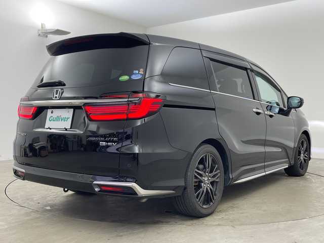 ホンダ オデッセイ ハイブリッド e:HEVアブソルート EX 兵庫県 2020(令2)年 4.7万km プレミアムスパークルブラックパール ・純正ナビ/・Bluetooth/CD/DVD/USB/TV/SD/HDMI/Apple car play/・全方位カメラ/・Honda SENSING/・衝突軽減ブレーキ（CMBS）、/・誤発進抑制機能/・後方誤発進抑制機能、歩行者/・事故低減ステアリング/・路外逸脱抑制機能/・渋滞追従機能付アダプティブクルーズコントロール（ACC）/・車線維持支援システム（LKAS）/・先行車発進お知らせ機能/・標識認識機能/・オートマチックハイビーム/・車両接近通報装置/・レーントレーシングアシスト/・ブラインドスポットシステム/・パワーバックドア/・フリップダウンモニター/・前後コーナーセンサー/・両側パワースライドドア/・ハーフレザーシート/・パワーシート/・シートヒーター/・オットマン/・純正フロアマット/・純正前後ドライブレコーダー/・ビルトインETC2.0/・AC100V充電/・純正18インチアルミホイールタイヤ/・LEDヘッドライト/・スマートキー/・ドアミラーヒーター