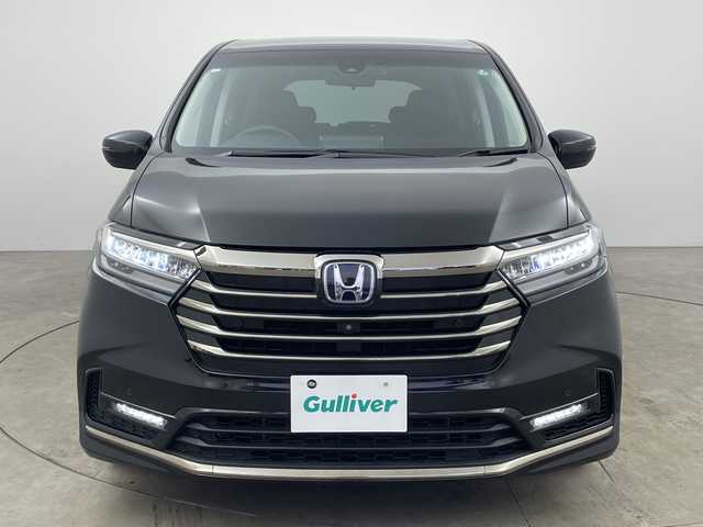 ホンダ オデッセイ ハイブリッド e:HEVアブソルート EX 兵庫県 2020(令2)年 4.7万km プレミアムスパークルブラックパール ・純正ナビ/・Bluetooth/CD/DVD/USB/TV/SD/HDMI/Apple car play/・全方位カメラ/・Honda SENSING/・衝突軽減ブレーキ（CMBS）、/・誤発進抑制機能/・後方誤発進抑制機能、歩行者/・事故低減ステアリング/・路外逸脱抑制機能/・渋滞追従機能付アダプティブクルーズコントロール（ACC）/・車線維持支援システム（LKAS）/・先行車発進お知らせ機能/・標識認識機能/・オートマチックハイビーム/・車両接近通報装置/・レーントレーシングアシスト/・ブラインドスポットシステム/・パワーバックドア/・フリップダウンモニター/・前後コーナーセンサー/・両側パワースライドドア/・ハーフレザーシート/・パワーシート/・シートヒーター/・オットマン/・純正フロアマット/・純正前後ドライブレコーダー/・ビルトインETC2.0/・AC100V充電/・純正18インチアルミホイールタイヤ/・LEDヘッドライト/・スマートキー/・ドアミラーヒーター