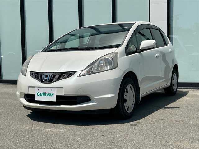 ホンダ フィット L 大阪府 2010(平22)年 8.5万km プレミアムホワイトパール 純正ナビ　/   TV/CD/DVD/Bluetooth/バックモニター/純正フロアマット/スマートキー/フルフラットシート/パワーウィンドウ/オートライト/ドアバイザー/ビルトインＥＴＣ/ダブルエアバック