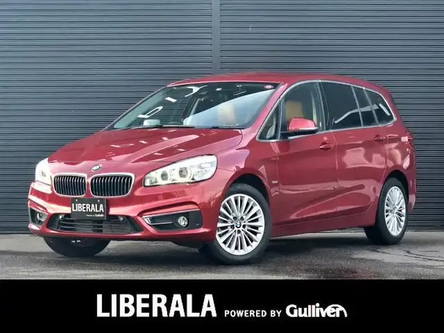 ＢＭＷ ２１８ｄ グランツアラー ラグジュアリー 山梨県 2017(平29)年 1.8万km 赤 茶革シート/ＡＣＣ/ヘッドアップディスプレイ/インテリジェントセーフティ(衝突軽減ブレーキ)/純正ＨＤＤナビ/バックカメラ/アンビエントライト/電動リアゲート/ＬＥＤヘッドライト/オートライト/前席シートヒーター/純正１７インチＡＷ/スマートキー