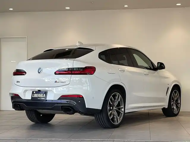 ＢＭＷ Ｘ４ M40i 愛知県 2020(令2)年 6.6万km 白 コニャックレザー　/ＨＵＤ　/純正ナビ　/Ｂｌｕｅｔｏｏｔｈ　/フルセグＴＶ　/３６０度カメラ　/ＡＣＣ　/ＬＫＡ　/ＢＳＭ　/シートヒーター　/ワイヤレスチャージ　/ドライブレコーダー　/ミラー型ＥＴＣ　/インテリジェントセーフティ/ミラーリンク/パワーバックドア/プッシュスタート/ウィンカーミラー/アイドリングストップ