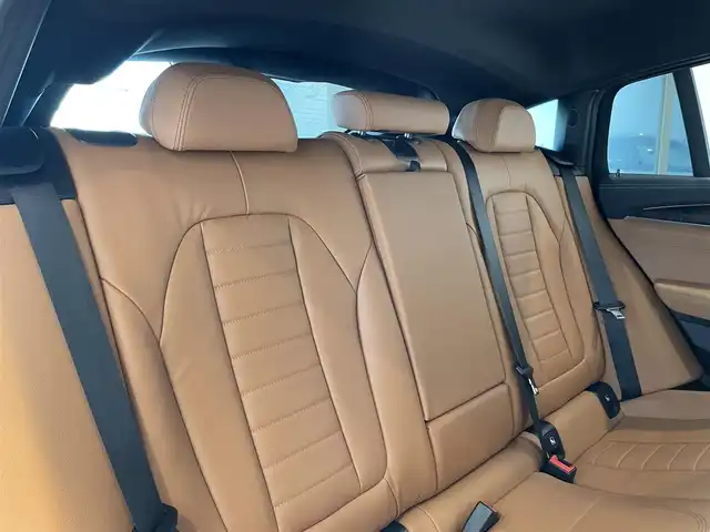 ＢＭＷ Ｘ４ M40i 愛知県 2020(令2)年 6.6万km 白 コニャックレザー　/ＨＵＤ　/純正ナビ　/Ｂｌｕｅｔｏｏｔｈ　/フルセグＴＶ　/３６０度カメラ　/ＡＣＣ　/ＬＫＡ　/ＢＳＭ　/シートヒーター　/ワイヤレスチャージ　/ドライブレコーダー　/ミラー型ＥＴＣ　/インテリジェントセーフティ/ミラーリンク/パワーバックドア/プッシュスタート/ウィンカーミラー/アイドリングストップ