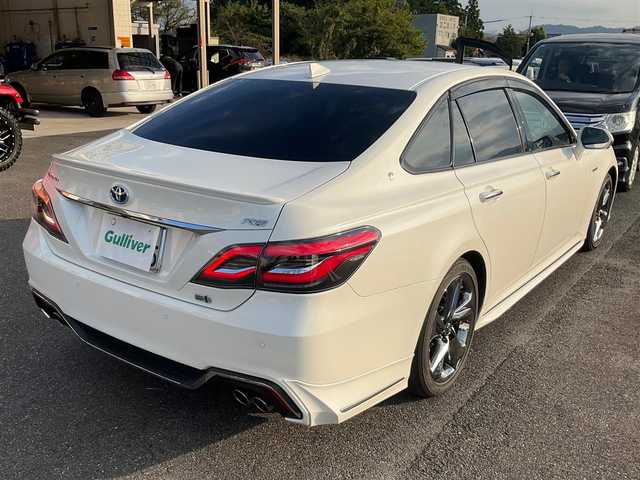 トヨタ クラウン ハイブリッド RS アドバンス 大分県 2019(平31)年 8.2万km ホワイトパールクリスタルシャイン 車検令和8年2月まで/純正18インチアルミホイール/　　（スパッタリング塗装/RS仕様専用）/3眼LEDヘッドランプ/・フォグランプ/エアロ（フロント/リヤ）/レザーパッケージ/・黒革シート/・前席ベンチレーション/前席シートヒーター/前席パワーシート/純正8インチメモリーナビゲーション/・CD/DVD/・フルセグTV/・Bluetooth/バックカメラ/純正ビルトインETC/コムテック前後ドライブレコーダー   /Toyota Safety Sense/カラーヘッドアップディスプレイ（HUD)/ブラインドスポットモニター(BSM)/取扱説明書/保証書/スペアキー/・カードキー