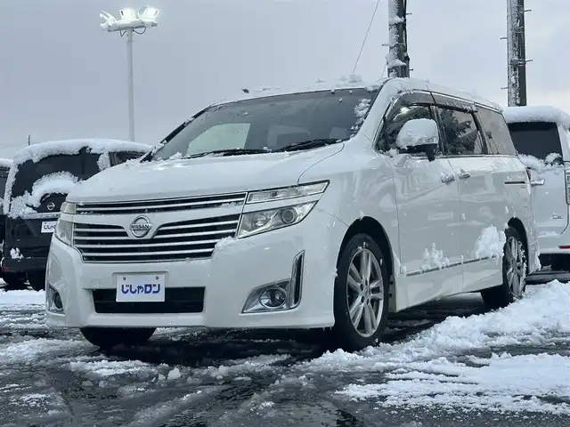 日産 エルグランド 250ハイウェイスター 道北・旭川 2013(平25)年 12.5万km ブリリアントホワイトパール (株)IDOMが運営する【じしゃロン旭川店】の自社ローン専用車両になります。こちらは現金またはオートローンご利用時の価格です。自社ローンご希望の方は別途その旨お申付け下さい/　/・社外ナビ(CD/DVD/BT/HDD/SD/フルセグ)/・バックカメラ/・ETC/・両側パワースライドドア/・フリップダウンモニター/・電動格納ウィンカーミラー/・プッシュスタート/・スマートキー2個/・フォグランプ/・オートライト/・現車装着サマータイヤ 純正AW225/55R18/・取扱説明書