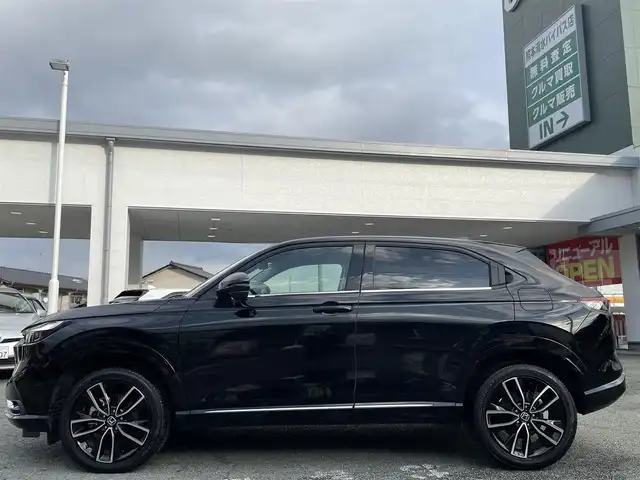 ホンダ ヴェゼル ハイブリッド e:HEV Z 熊本県 2021(令3)年 8.5万km クリスタルブラックパール ワンオーナー/プレミアムオーディオ【10スピーカー】/純正ナビ/【フルセグTV/Bluetooth/USB】/全周囲カメラ/デジタルインナーミラー/レーダークルーズコントロール/ブラインドスポットモニター/シートヒーター/ステアリングヒーター/電子パーキング/オートホールド/オートLEDヘッドライト/純正18インチAW/置くだけ充電/パワーバックドア/ステアリングスイッチ/パドルシフト/前後ドライブレコーダー/ETC2.0/取扱説明書