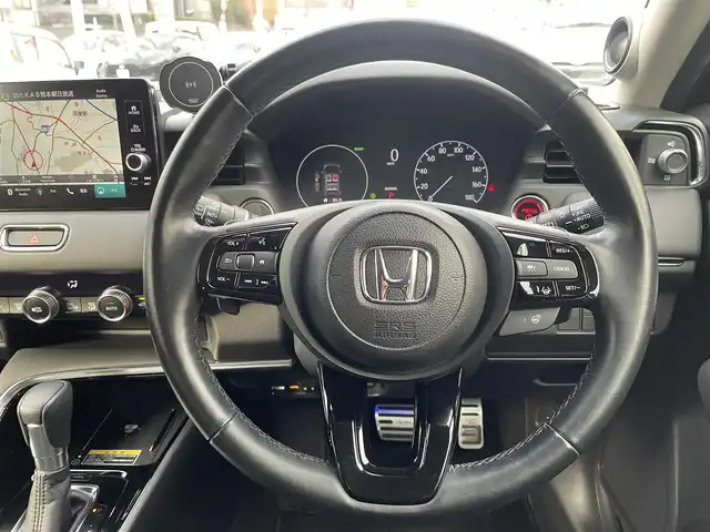 ホンダ ヴェゼル ハイブリッド e:HEV Z 熊本県 2021(令3)年 8.5万km クリスタルブラックパール ワンオーナー/プレミアムオーディオ【10スピーカー】/純正ナビ/【フルセグTV/Bluetooth/USB】/全周囲カメラ/デジタルインナーミラー/レーダークルーズコントロール/ブラインドスポットモニター/シートヒーター/ステアリングヒーター/電子パーキング/オートホールド/オートLEDヘッドライト/純正18インチAW/置くだけ充電/パワーバックドア/ステアリングスイッチ/パドルシフト/前後ドライブレコーダー/ETC2.0/取扱説明書