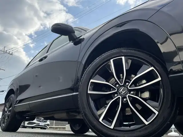 ホンダ ヴェゼル ハイブリッド e:HEV Z 熊本県 2021(令3)年 8.5万km クリスタルブラックパール ワンオーナー/プレミアムオーディオ【10スピーカー】/純正ナビ/【フルセグTV/Bluetooth/USB】/全周囲カメラ/デジタルインナーミラー/レーダークルーズコントロール/ブラインドスポットモニター/シートヒーター/ステアリングヒーター/電子パーキング/オートホールド/オートLEDヘッドライト/純正18インチAW/置くだけ充電/パワーバックドア/ステアリングスイッチ/パドルシフト/前後ドライブレコーダー/ETC2.0/取扱説明書