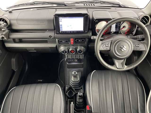スズキ ジムニー XC 愛知県 2023(令5)年 2.4万km ブルーイッシュブラックパール3 禁煙車/パートタイム4WD（2H/4H/4L）/5速MT/純正8インチナビ/（CD/DVD/Bluetooth/フルセグ/SD/USB）/バックカメラ/スズキセーフティサポート/クルーズコントロール/レーンキープアシスト/デュアルセンサーブレーキサポート/ヒルホールドコントロール/ハイビームアシスト/ETC/レザーシート/D+N席シートヒーター/フルフラットシート/アイドリングストップ/純正16インチホイール/ドアミラーヒーター/LEDヘッドライト/フォグランプ/純正フロアマット/横滑り防止装置/純正サンバイザー/スペアキー