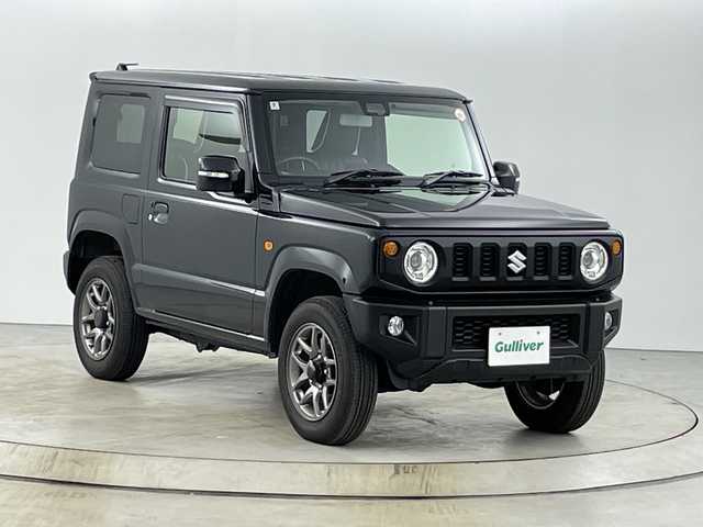 スズキ ジムニー XC 愛知県 2023(令5)年 2.4万km ブルーイッシュブラックパール3 禁煙車/パートタイム4WD（2H/4H/4L）/5速MT/純正8インチナビ/（CD/DVD/Bluetooth/フルセグ/SD/USB）/バックカメラ/スズキセーフティサポート/クルーズコントロール/レーンキープアシスト/デュアルセンサーブレーキサポート/ヒルホールドコントロール/ハイビームアシスト/ETC/レザーシート/D+N席シートヒーター/フルフラットシート/アイドリングストップ/純正16インチホイール/ドアミラーヒーター/LEDヘッドライト/フォグランプ/純正フロアマット/横滑り防止装置/純正サンバイザー/スペアキー