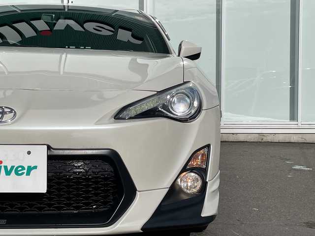 トヨタ ８６ GT 神奈川県 2012(平24)年 5万km サテンホワイトパール ６速ＭＴ　/ＴＲＤエアロ　/ＴＲＤマフラー　/純正ナビＴＶ/（BluRay/DVD/Blutooth/フルセグ）/社外USBポート
