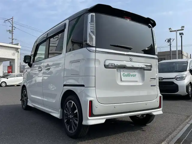 スズキ スペーシア カスタム HYBRID XS ターボ 広島県 2022(令4)年 2.1万km ピュアホワイトパール/ブラック2トーン 後期モデル/ワンオーナー/純正8インチナビ（CD/DVD/フルセグTV/Bluetooth）/全方位モニター/ETC/360°ドライブレコーダー/両側パワースライドドア/ハーフレザーシート/・シートヒーター/衝突被害軽減ブレーキ/車線逸脱警報/レーダークルーズコントロール/コーナーセンサー/LEDヘッドライト/2列目シートバックテーブル/プッシュスタート/スペアキー