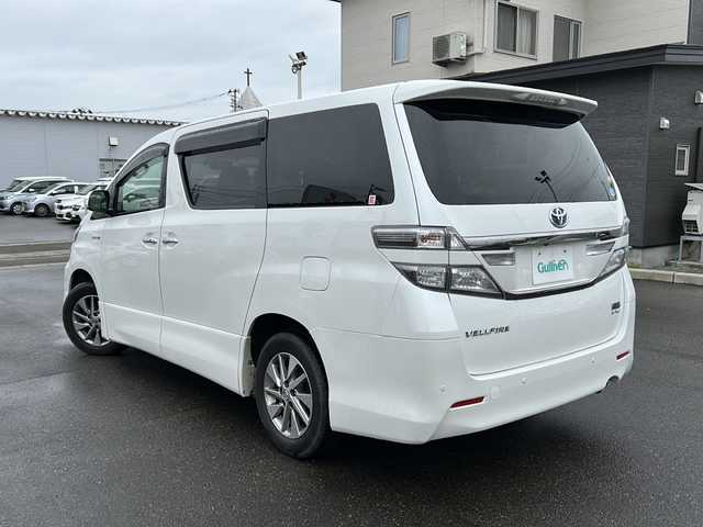 トヨタ ヴェルファイア ハイブリット ZR 秋田県 2012(平24)年 8.6万km ホワイトパールクリスタルシャイン 登録時走行距離８６０５８ｋｍ/純正HDDナビ/CD/DVD/Bluetooth/バックカメラ/フルセグTV/ETC/クルーズコントロール/運助パワーシート/横滑り防止装置/盗難防止装置/前後コーナーセンサー/アイドリングストップ/格納ウィンカーミラー/純正AW/純正フロアマット/LEDヘッドライト/フォグランプ/スマートキー