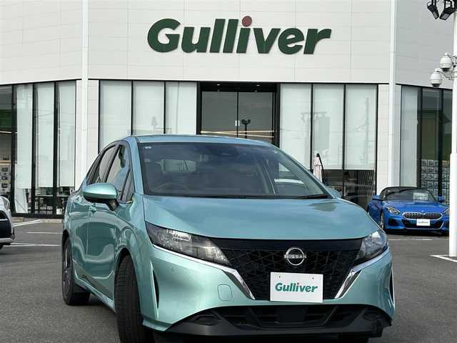 日産 ノート X 長崎県 2023(令5)年 5.5万km 緑／グレー 純正ナビ/Bluetooth接続/全方位カメラ/バックカメラ/プッシュスタート/スマートキー/パワーウィンドウ/パワーステアリング/前後コーナーセンサー/クルーズコントロール/ETC