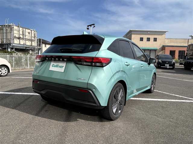 日産 ノート X 長崎県 2023(令5)年 5.5万km 緑／グレー 純正ナビ/Bluetooth接続/全方位カメラ/バックカメラ/プッシュスタート/スマートキー/パワーウィンドウ/パワーステアリング/前後コーナーセンサー/クルーズコントロール/ETC