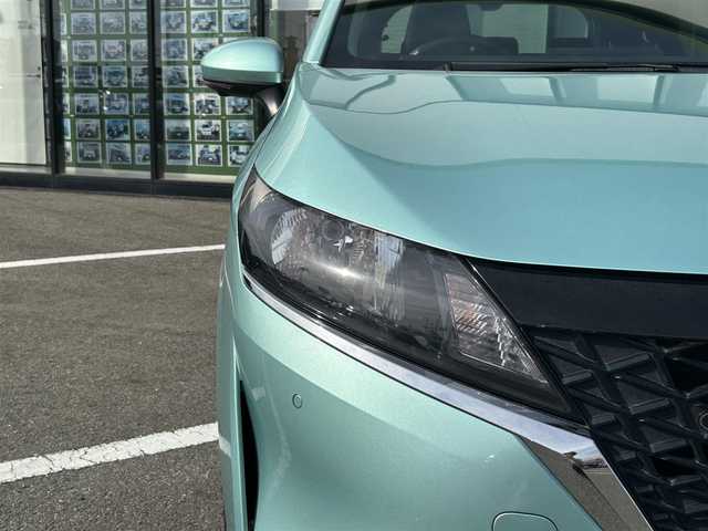 日産 ノート X 長崎県 2023(令5)年 5.5万km 緑／グレー 純正ナビ/Bluetooth接続/全方位カメラ/バックカメラ/プッシュスタート/スマートキー/パワーウィンドウ/パワーステアリング/前後コーナーセンサー/クルーズコントロール/ETC