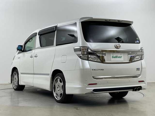トヨタ ヴェルファイア ハイブリット ZR 道央・札幌 2012(平24)年 4.7万km ホワイトパールクリスタルシャイン ・４WD/・モデリスタエアロ（フロント.リア）/・ムーンルーフ/・純正HDDディーラーOPナビ/・DVD.CD.SD.Bluetooth/・フルセグTV/バックカメラ/・両側パワースライドドア/・パワーバックドア /・助手席・二列目オットマンシート/・運転席・助手席パワーシート/・HIDライト/オートライト/・クルーズコントロール/・ウッドコンビハンドル/・クリアランスソナー/・ドライブレコーダー前後/・ETC/AFS/・メッキパーツ多数
