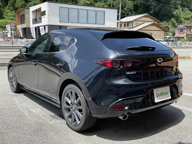 マツダ マツダ３ファストバック 15S ツーリング 岐阜県 2020(令2)年 6.6万km ジェットブラックマイカ ワンオーナー/純正SDナビ/(ワンセグテレビ.AM.FM.Bluetooth)/全方位カメラ/クルーズコントロール/衝突軽減ブレーキ/レーンキープアシスト/コーナーセンサー/純正アルミホイール/ドライブレコーダー/ETC/アイドリングストップ/ウィンカーミラー/プッシュスタート/スマートキー/スペアキー/保証書/取扱説明書