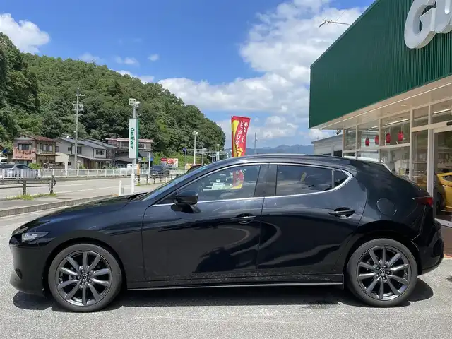 マツダ マツダ３ファストバック 15S ツーリング 岐阜県 2020(令2)年 6.6万km ジェットブラックマイカ ワンオーナー/純正SDナビ/(ワンセグテレビ.AM.FM.Bluetooth)/全方位カメラ/クルーズコントロール/衝突軽減ブレーキ/レーンキープアシスト/コーナーセンサー/純正アルミホイール/ドライブレコーダー/ETC/アイドリングストップ/ウィンカーミラー/プッシュスタート/スマートキー/スペアキー/保証書/取扱説明書