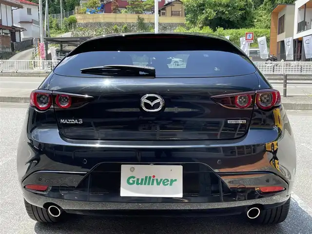 マツダ マツダ３ファストバック 15S ツーリング 岐阜県 2020(令2)年 6.6万km ジェットブラックマイカ ワンオーナー/純正SDナビ/(ワンセグテレビ.AM.FM.Bluetooth)/全方位カメラ/クルーズコントロール/衝突軽減ブレーキ/レーンキープアシスト/コーナーセンサー/純正アルミホイール/ドライブレコーダー/ETC/アイドリングストップ/ウィンカーミラー/プッシュスタート/スマートキー/スペアキー/保証書/取扱説明書
