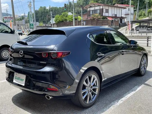 マツダ マツダ３ファストバック 15S ツーリング 岐阜県 2020(令2)年 6.6万km ジェットブラックマイカ ワンオーナー/純正SDナビ/(ワンセグテレビ.AM.FM.Bluetooth)/全方位カメラ/クルーズコントロール/衝突軽減ブレーキ/レーンキープアシスト/コーナーセンサー/純正アルミホイール/ドライブレコーダー/ETC/アイドリングストップ/ウィンカーミラー/プッシュスタート/スマートキー/スペアキー/保証書/取扱説明書