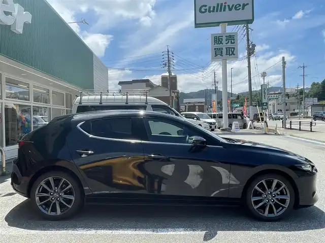 マツダ マツダ３ファストバック 15S ツーリング 岐阜県 2020(令2)年 6.6万km ジェットブラックマイカ ワンオーナー/純正SDナビ/(ワンセグテレビ.AM.FM.Bluetooth)/全方位カメラ/クルーズコントロール/衝突軽減ブレーキ/レーンキープアシスト/コーナーセンサー/純正アルミホイール/ドライブレコーダー/ETC/アイドリングストップ/ウィンカーミラー/プッシュスタート/スマートキー/スペアキー/保証書/取扱説明書