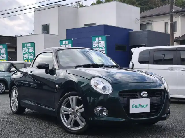 ダイハツ コペン セロ 熊本県 2016(平28)年 9.6万km ブリティッシュグリーンマイカ 純正ナビ（NSCT-W61D）/【ワンセグTV/CD/AM/FM】/バックカメラ/革巻きステアリング/ステアリングスイッチ/シートヒーター/プッシュスタート/スマートキー/純正16インチAW/純正フロアマット/ETC/保証書/取扱説明書