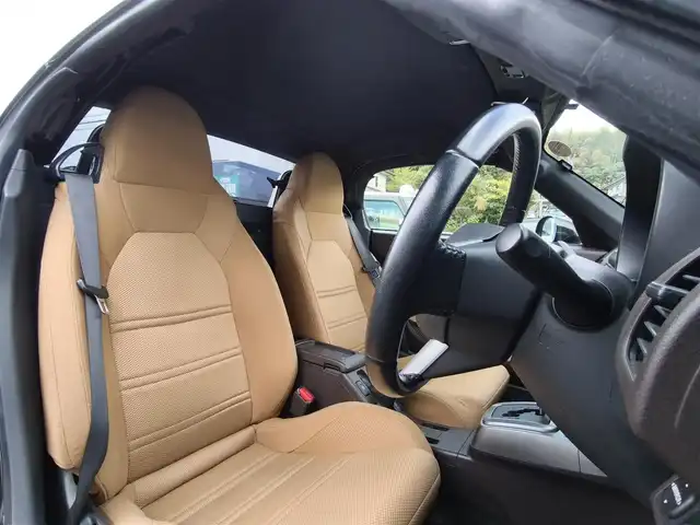 ダイハツ コペン セロ 熊本県 2016(平28)年 9.6万km ブリティッシュグリーンマイカ 純正ナビ（NSCT-W61D）/【ワンセグTV/CD/AM/FM】/バックカメラ/革巻きステアリング/ステアリングスイッチ/シートヒーター/プッシュスタート/スマートキー/純正16インチAW/純正フロアマット/ETC/保証書/取扱説明書