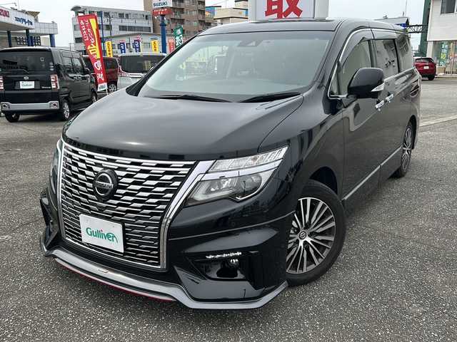 日産 エルグランド 250ハイウェイスターS 富山県 2021(令3)年 1.8万km 黒 スマートキー/ハーフレザーシート/両側パワースライドドア/メーカーオプションメモリーナビ/３列シート/全周囲モニター/BSM/フルセグTV/Bluetooth/ビルトインETC/純正18インチAW/レーダークルーズコントロール/LEDヘッドライト/フォグランプ/純正フロアマット/純正ドアバイザー/横滑り防止装置/電動格納ウィンカーミラー/ドラレコ（前）/オットマン/クリアランスソナー/AFS/ステアリングスイッチ/パワーバックドア/フロントエアロ（NISMO）/USB端子（３個）/保証書・取説・ナビ取説
