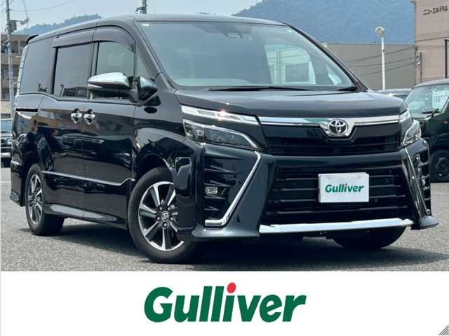 トヨタ ヴォクシー ZS 煌Ⅱ 広島県 2020(令2)年 3.9万km ブラック ワンオーナー/純正ナビ　NSZN-Z68T/　「CD/DVD/フルセグTV/Bluetooth」/バックカメラ/前後ドライブレコーダー/ETC/クルーズコントロール/両側パワースライドドア/衝突被害軽減システム/フリップダウンモニター/前後コーナーセンサー/フォグランプ/LEDヘッドライト/デジタルインナーミラー/オートライト/オートマチックハイビーム/プッシュスタート/純正フロアマット/純正16インチホール/保証書/取扱説明書