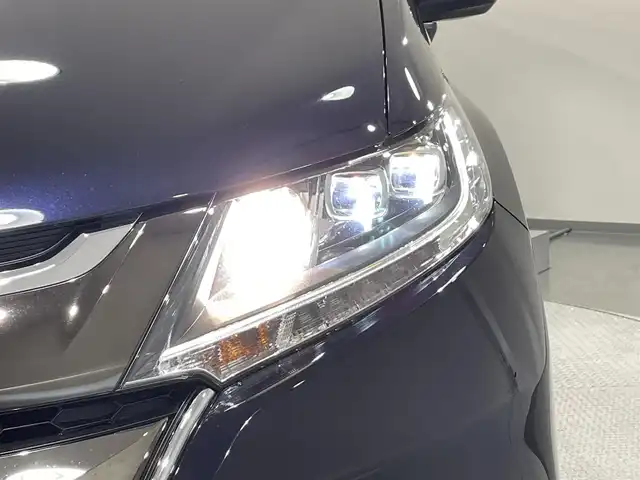ホンダ オデッセイ ハイブリッド アブソルート ホンダセンシング 愛知県 2018(平30)年 6.6万km プレミアムヴィーナスブラックP 純正９インチナビ　/(ラジオ/CD・DVD再生/フルセグTV/SD/USB/Bluetooth/CarPlay/HDMI)/ホンダセンシング/　　-レーダークルーズコントロール　/　　-衝突軽減ブレーキ　/　　-路線逸脱警報/　　-車線維持支援システム/　　-先行車発進告知機能/　　-標識認識機能/　　-オートハイビーム/両側パワースライドドア　/ビルトインＥＴＣ２．０　/ＬＥＤヘッドライト/LEDフォグランプ　/バックカメラ　/ドライブレコーダー　/D席パワーシート　/プッシュスタート　/　　-スマートキー/ＨＤＭＩ端子