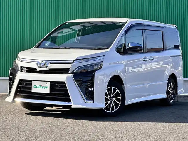 トヨタ ヴォクシー ZS 煌Ⅱ 宮城県 2019(令1)年 8.8万km ホワイトパールクリスタルシャイン セーフティセンス/・プリクラッシュセーフティ/・レーンディパーチャーアラート/・オートマチックハイビーム/KENWOOD9インチナビ/【CD・DVD・SD・BT】/フルセグテレビ/バックカメラ/ETC/両側パワースライドドア/デュアルエアコン/本革巻きステアリング/クルーズコントロール/UVカットガラス/リアサンシェード/折りたたみテーブル/LEDヘッドライト/LEDフォグランプ/ドアバイザー/メッキウインカーミラー/折りたたみテーブル/プッシュスタート/社外15インチAW/Wエアバッグ