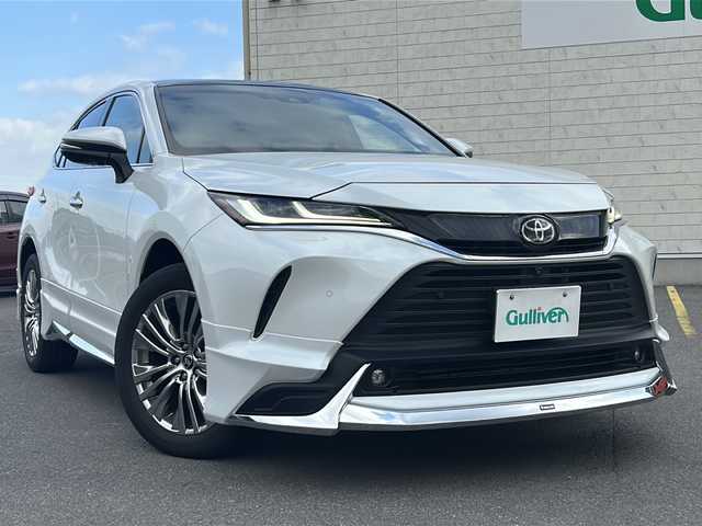 トヨタ ハリアー Z レザーパッケージ 香川県 2023(令5)年 3.1万km 白 T-Connect SDナビ＋JBLプレミアムサウンドシステム（フルセグTV/BT)/アラウンドビューモニター/ヘッドアップディスプレイ/ブラインドスポットモニター/デジタルインナーミラー/ステアリングヒーター/モデリスタ（フロント，サイド，リア）/ガラスルーフ/電動リアゲート/パワーシート/シートヒーター/コーナーセンサー/シートメモリー/ビルトインETC2.0/LEDヘッドライト