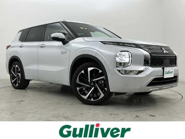 三菱 アウトランダー ＰＨＥＶ P 宮城県 2022(令4)年 6.2万km ホワイトダイヤモンド 禁煙車/BOSEサウンドスピーカー/マルチビューモニター/マイパイロット/三菱e-Assist/・衝突軽減ブレーキ/・車線逸脱警報/・ブラインドスポットモニター/・リアクロストラフィックアラート/・オートハイビーム/・ヘッドアップディスプレイ/純正ナビ/・BT.USB.スマホ連携/フルセグTV/レザーシート/・前席パワーシート（D席メモリー付）/・シートヒーター（1/2列目）/パワーバックドア/ビルトインETC2.0/パドルシフト/ステアリングヒーター/ステアリングスイッチ/横滑り防止装置/AC1500W充電/LEDヘッドライト/LEDフォグランプ/プッシュスタート/スマートキー/純正20インチアルミホイール/純正フロアマット