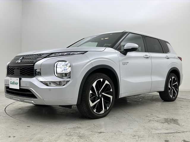 三菱 アウトランダー ＰＨＥＶ P 宮城県 2022(令4)年 6.2万km ホワイトダイヤモンド 禁煙車/BOSEサウンドスピーカー/マルチビューモニター/マイパイロット/三菱e-Assist/・衝突軽減ブレーキ/・車線逸脱警報/・ブラインドスポットモニター/・リアクロストラフィックアラート/・オートハイビーム/・ヘッドアップディスプレイ/純正ナビ/・BT.USB.スマホ連携/フルセグTV/レザーシート/・前席パワーシート（D席メモリー付）/・シートヒーター（1/2列目）/パワーバックドア/ビルトインETC2.0/パドルシフト/ステアリングヒーター/ステアリングスイッチ/横滑り防止装置/AC1500W充電/LEDヘッドライト/LEDフォグランプ/プッシュスタート/スマートキー/純正20インチアルミホイール/純正フロアマット