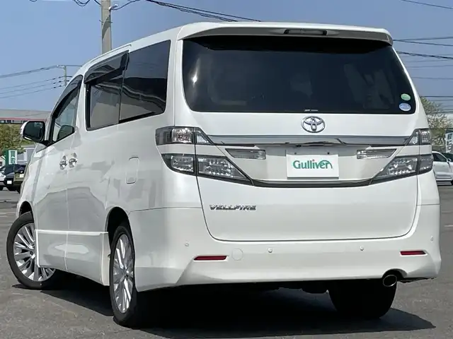 トヨタ ヴェルファイア 2．4Z Gエディション 道央・札幌 2012(平24)年 5.8万km ホワイトパールクリスタルシャイン ４WD/純正ディーラーOPナビ/CD/DVD/BT/フルセグ/横滑り防止装置/クルーズコントロール/クリアランスソナー/バックカメラ/ビルトインETC/ドライブレコーダー/ECOMODE/デフロック/両側パワースライドドア/パワーバックドア/前席/２列目パワーシート/前席シートヒーター/D席メモリーシート/N席/２列目オットマン/レザーシート/革巻きウッドコンビステアリング/ステアリングリモコン/AC100V/自動防眩ミラー/MTモード付AT/nanoe/レーダー探知機/プッシュスタート/スマートキー/HIDヘッドライト/オートライト/フォグランプ/電動格納ミラー/ウィンカーミラー/純正フロアマット/ドアバイザー