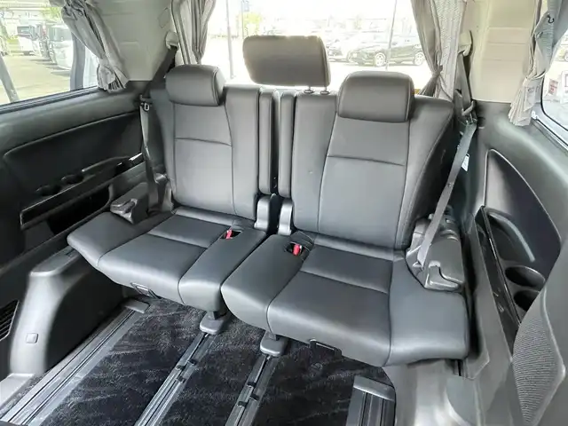トヨタ ヴェルファイア 2．4Z Gエディション 道央・札幌 2012(平24)年 5.8万km ホワイトパールクリスタルシャイン ４WD/純正ディーラーOPナビ/CD/DVD/BT/フルセグ/横滑り防止装置/クルーズコントロール/クリアランスソナー/バックカメラ/ビルトインETC/ドライブレコーダー/ECOMODE/デフロック/両側パワースライドドア/パワーバックドア/前席/２列目パワーシート/前席シートヒーター/D席メモリーシート/N席/２列目オットマン/レザーシート/革巻きウッドコンビステアリング/ステアリングリモコン/AC100V/自動防眩ミラー/MTモード付AT/nanoe/レーダー探知機/プッシュスタート/スマートキー/HIDヘッドライト/オートライト/フォグランプ/電動格納ミラー/ウィンカーミラー/純正フロアマット/ドアバイザー