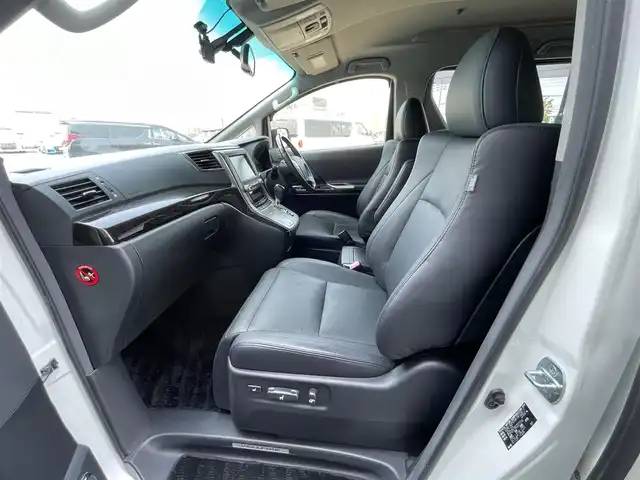 トヨタ ヴェルファイア 2．4Z Gエディション 道央・札幌 2012(平24)年 5.8万km ホワイトパールクリスタルシャイン ４WD/純正ディーラーOPナビ/CD/DVD/BT/フルセグ/横滑り防止装置/クルーズコントロール/クリアランスソナー/バックカメラ/ビルトインETC/ドライブレコーダー/ECOMODE/デフロック/両側パワースライドドア/パワーバックドア/前席/２列目パワーシート/前席シートヒーター/D席メモリーシート/N席/２列目オットマン/レザーシート/革巻きウッドコンビステアリング/ステアリングリモコン/AC100V/自動防眩ミラー/MTモード付AT/nanoe/レーダー探知機/プッシュスタート/スマートキー/HIDヘッドライト/オートライト/フォグランプ/電動格納ミラー/ウィンカーミラー/純正フロアマット/ドアバイザー