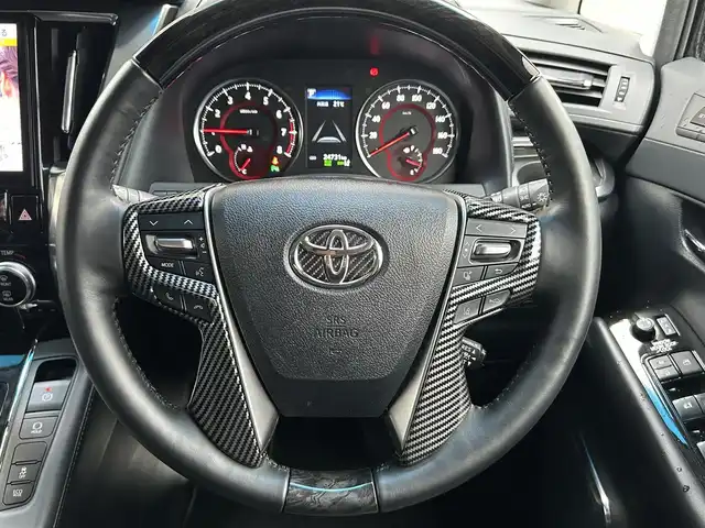 トヨタ ヴェルファイア Z Gエディション 大阪府 2019(令1)年 2.5万km ブラック ワンオーナー/ツインムーンルーフ/モデリスタエアロ/ALPINE BIGX ナビ（EX11Z）/・AM/FM/CD/DVD/BT/フルセグTV/バックカメラ/ALPINE 12.8インチ後席用モニタ（PXH12X-B）/デジタルインナーミラー/トヨタセーフティーセンス/・プリクラッシュセーフティーセンス/・レーンディパーチャーアラート/・レーダークルーズコントロール/・ロードサインアシスト/オートマチックハイビーム/ブラインドスポットモニター/リアクロストラフィックアラート/インテリジェントクリアランスソナー/両側パワースライドドア/電動リアゲート/黒革シート/D席メモリ付きパワーシート/D/N シートヒーター/ベンチレーション/ウッドコンビステアリング/ステアリングヒーター/三眼LEDヘッドライト/前後ドラレコ（TZ-D205W）/取扱説明書/保証書/スペアキー/記録簿R2/R3/R4/R5/R6/R7