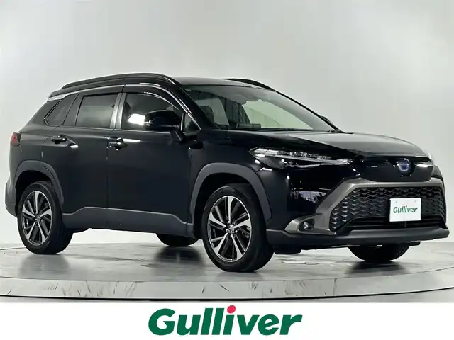 トヨタ カローラ クロス ハイブリッド Z 佐賀県 2021(令3)年 4.9万km アティチュードブラックマイカ 純正9インチディスプレイオーディオ/AM/FM/Bluetooth/Mirrorcast/衝突被害軽減システム/バックカメラ/レーダークルーズコントロール/レーンキープアシスト/クリアランスソナー/ロードサインアシスト/オートライト/オートマチックハイビーム/オートブレーキホールド/電子パーキング/前後ドライブレコーダー/ビルトインETC/パワーバックドア/フロアマット/ハーフレザーシート/運転席・助手席シートヒーター/運転席パワーシート/純正18インチアルミホイール/LEDヘッドライト/フォグライト/スマートキー/スペアキー×1