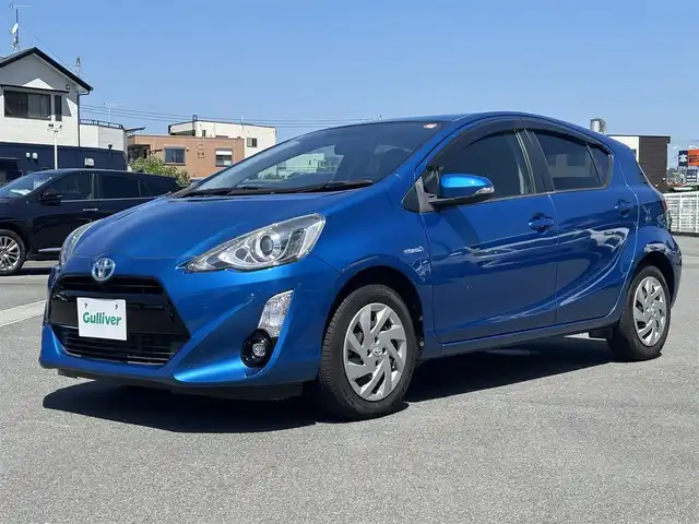 トヨタ アクア G 静岡県 2015(平27)年 2.7万km コバルトブルーメタリック エンジンスタートボタン/パワーステアリング/パワーウィンドウ/取扱説明書/アイドリングストップ/オートエアコン/スペアキー/クルーズコントロール/SDナビ（CD/DVD/BT/フルセグ）/ETC/純正フロアマット/ABS/横滑り防止装置/オートライト/LEDヘッドライト/Wエアバック