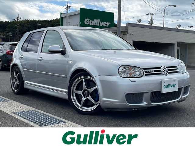 フォルクスワーゲン ゴルフ R32 山口県 2003(平15)年 10.7万km シルバー ワンオーナー車/6速マニュアル車/禁煙車（前オーナー様のご申告に基づく）/黒レザーシート/前席シートヒーター/社外マフラー（REMUS製）/ダウンサス/社外18インチAW/キセノンライト/リモコンキー/ETC/パワーウィンドゥ/純正フロアマット/純正MDオーディオ（ラジオあり）/革巻きステアリング/リアトノカバー/保証書・取説/スペアキー1個