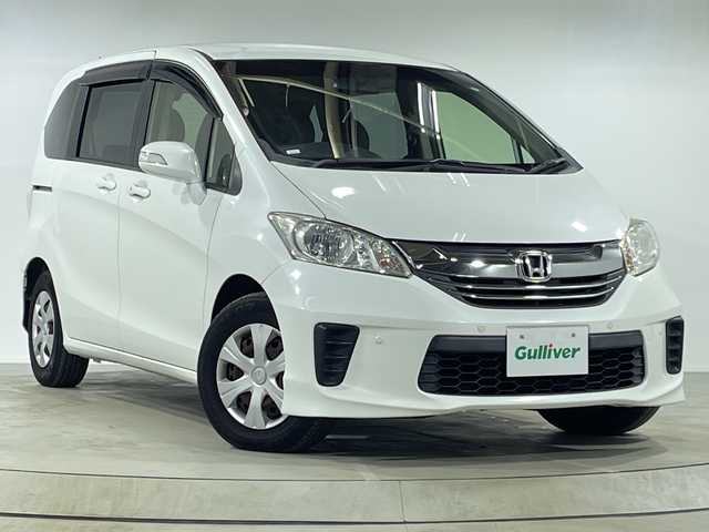 ホンダ フリード G プレミアムエディション 神奈川県 2015(平27)年 4.6万km ホワイトオーキッドパール 両側電動/社外7型ナビ/Bカメラ/ETC/TV/クルーズコントロール/ハーフレザーシート/HIDヘッドライト/オートライト/電動格納ミラー/ウインカーミラー/スペアキー/取扱説明書/スペアキー